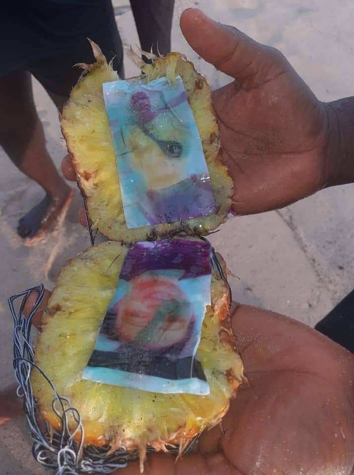 animolenikun's tweet image. Things we see on the Atlantic shoreline. Pictures of a guy and a lady placed in a pineapple &amp;amp; bound. Voodoo? Love charm? Some sweet juicy love is about to turn very bitter innit?

#copiedpost