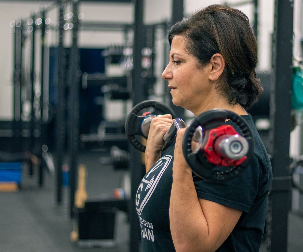 Unless you're training to workout during an earthquake, squatting on a Bosu ball is not functional. Here's a real example; picking up a toddler requires the back strength of a deadlift, the bicep strength of hammer curls and the shoulder strength of shoulder presses.