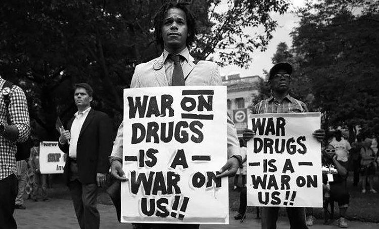 1980s: Reagan - War on DrugsThrough federal funding, local law enforcement was militarized to the point where even rural police departments now have SWAT teams. Another generation of Black families are fractured by these racist policies.