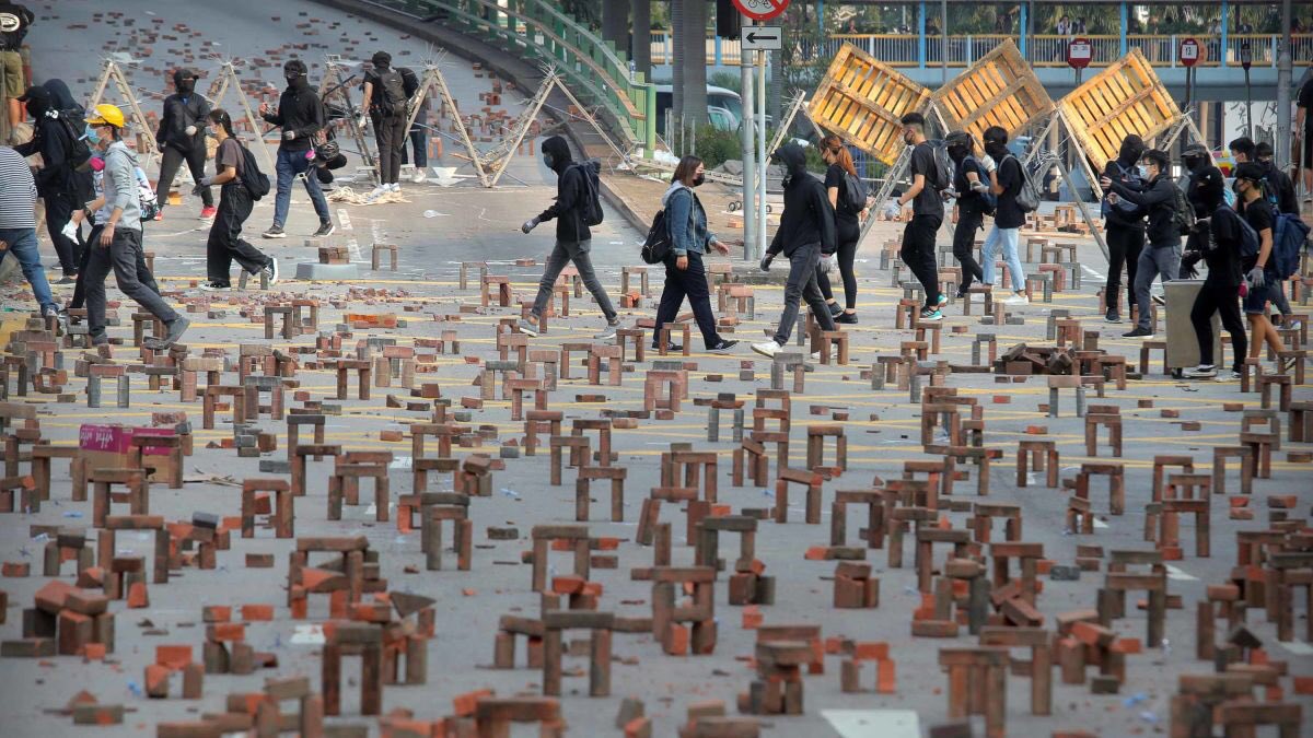 what to do with the bricks: set them up as barricades the way hongkong did so cop cars will have a hard time manouvering towards the people and running them over.  https://twitter.com/halsey/status/1267341686784405504
