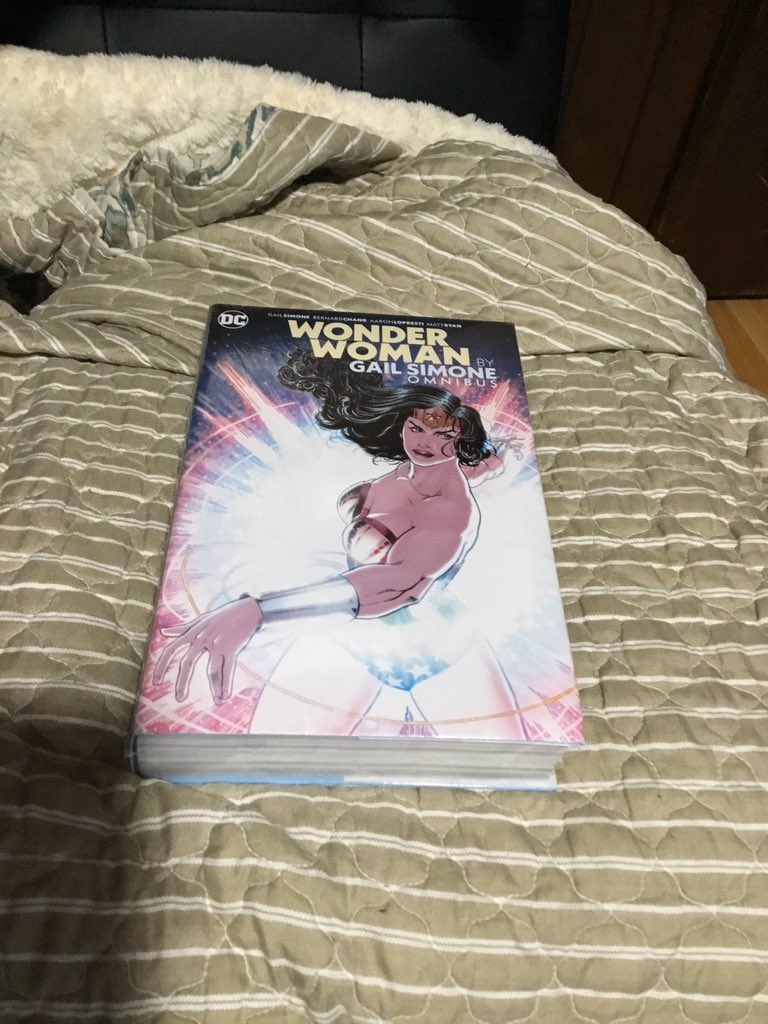 And finally, a signed and personalized copy of my Wonder Woman omnibus, probably some of the superhero stories I am most proud of (the thing is huge and weighs a ton). Here you see it being contemplated by my dog, Dasher.40/