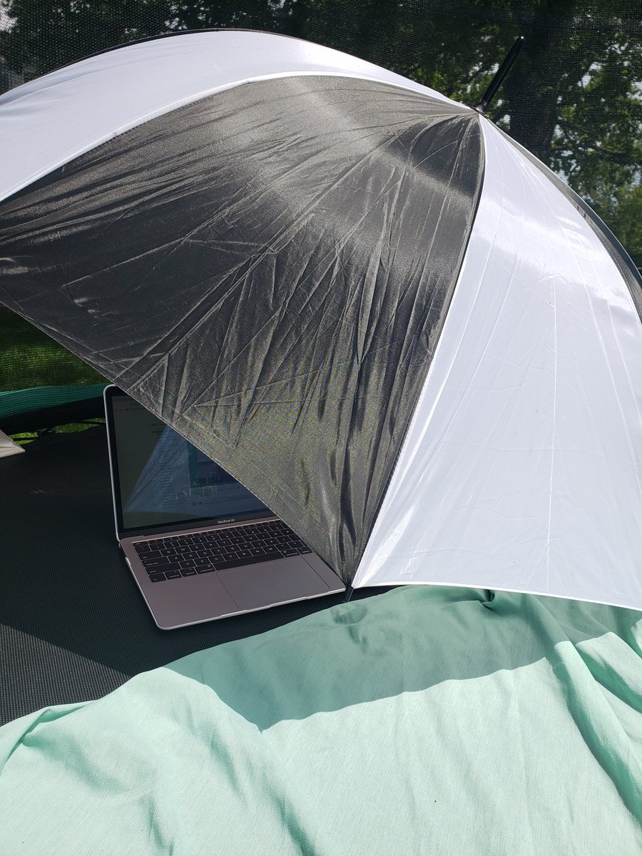 When you have training to do and it's nice outside. You put on your sunscreen and shade your computer! #gcscpride #jbsrocks