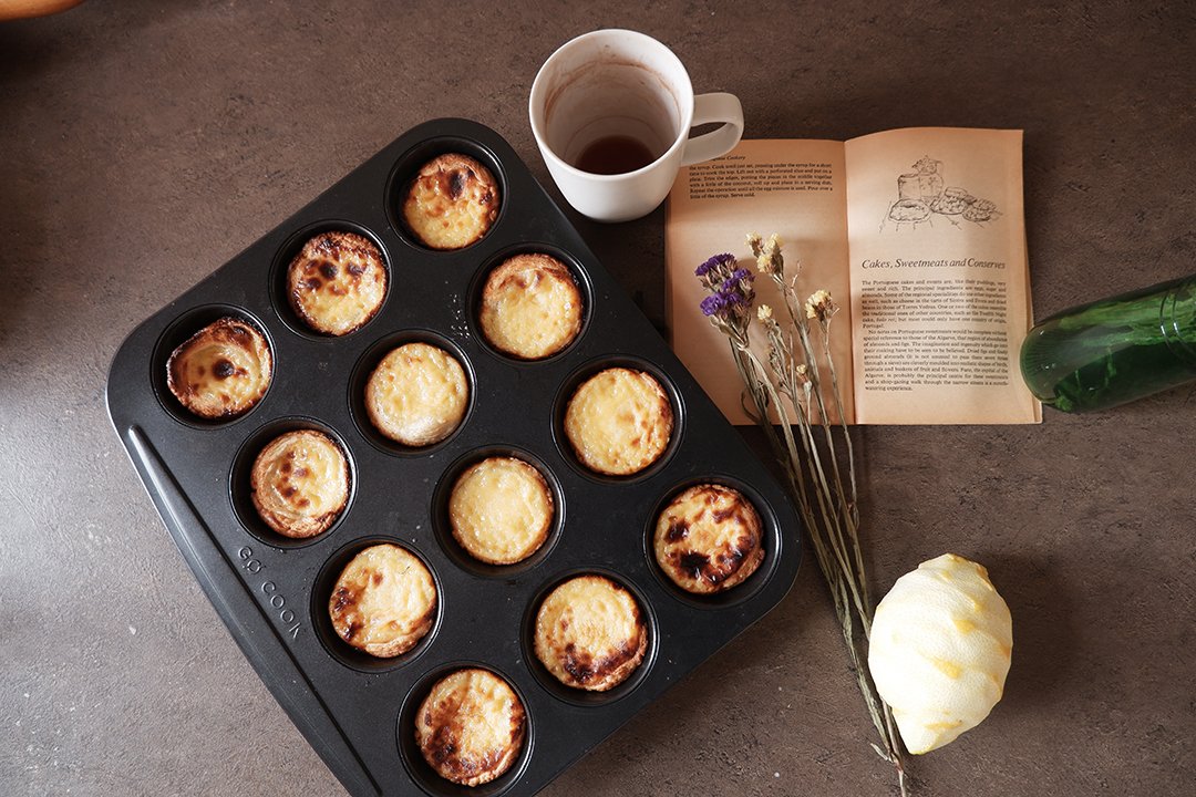 cityodes's tweet photo. A taste of #Portugal in Prague. Spent the weekend baking these delicious pastéis de nata following a recipe from the @devourtours cookbook. https://t.co/cTvcDU1rA1
