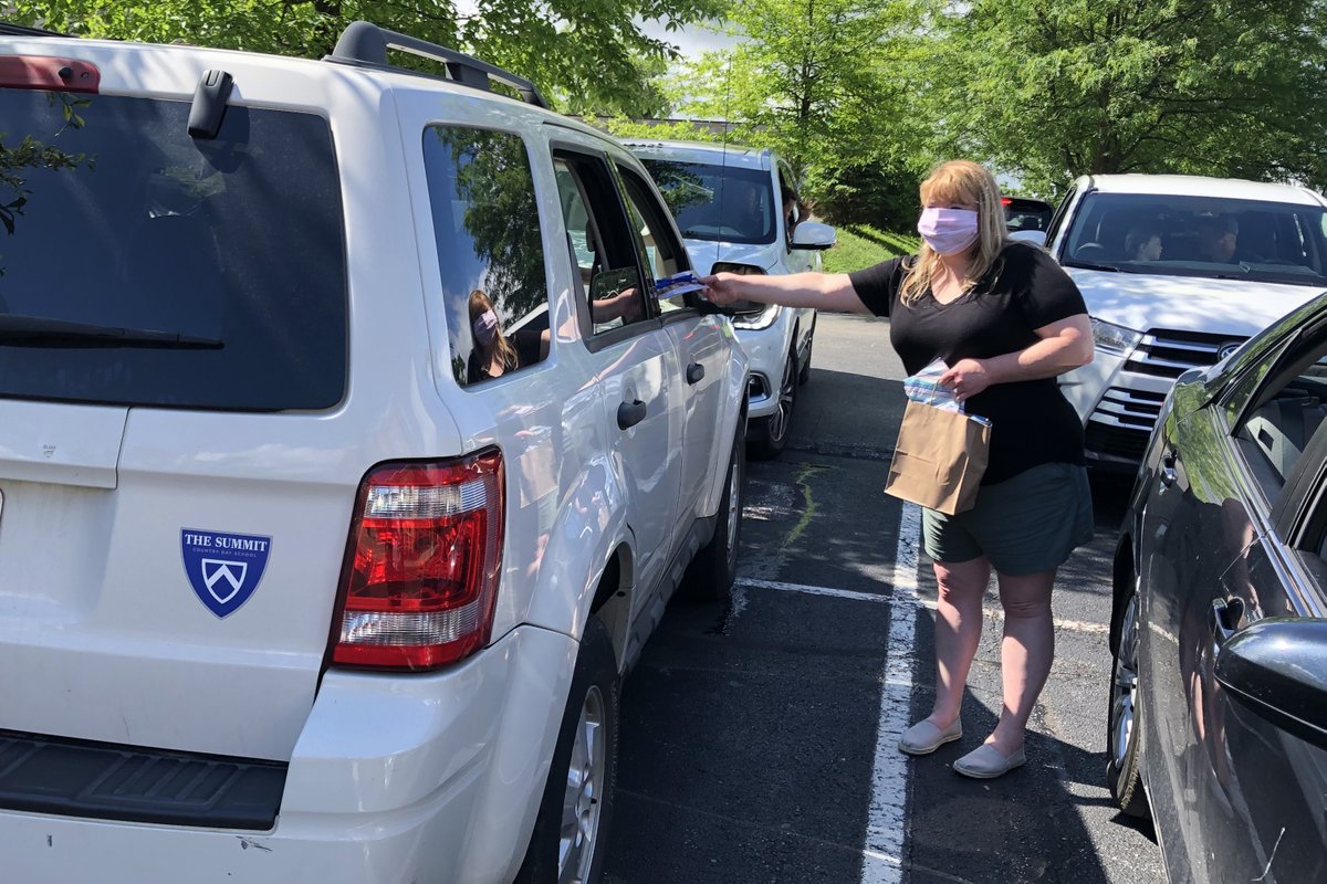 SummitCDS's tweet photo. Montessori teachers delivered custom yearbooks to parents who came by to pick up their children's belongings. The books compiled memorabilia of their children's experiences throughout the year. #Summitcds #SummitCommunity #MontessoriMonday https://t.co/m9ng04ZOdn