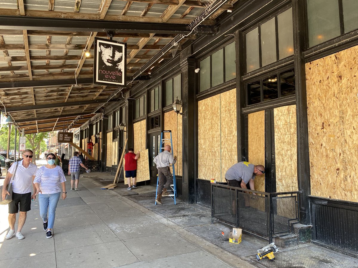 Lot of Old Market businesses covering windows today. Police are setting a perimeter a little wider than the block around the location in front of where James Scurlock was shot.