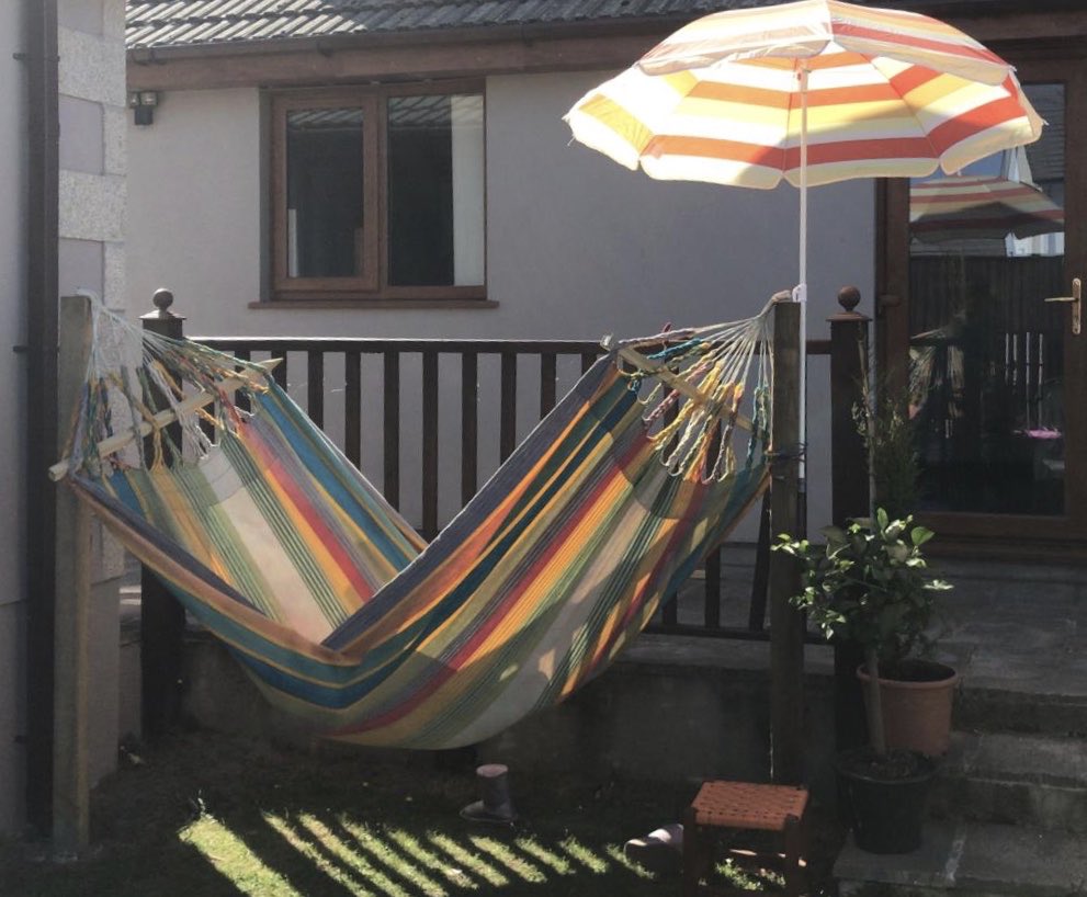 I was given a hammock age 13. Since then I’ve carted it around the world waiting for the right trees. Age 42, gave up on perfect trees and just asked someone to put up two posts: massive cost of £15. Sun and swing mindfulness after work - priceless!