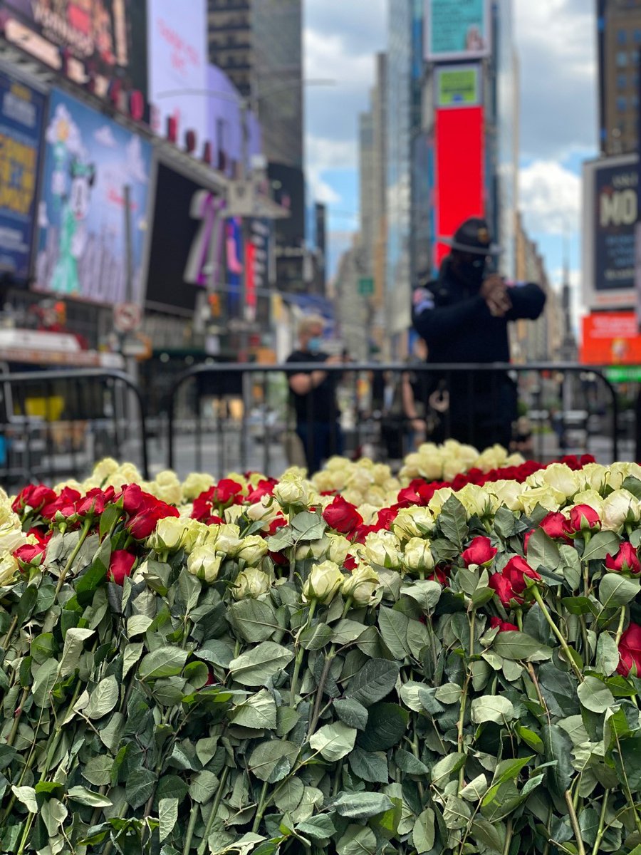 10,000 flowers in Times Square, joining thousands of protesters. The red: the anger &amp; blood of black lives lost through injustice; the white: hope that change will FINALLY come. Together the flowers represent the love that can help us to hear each other &amp; heal each other.