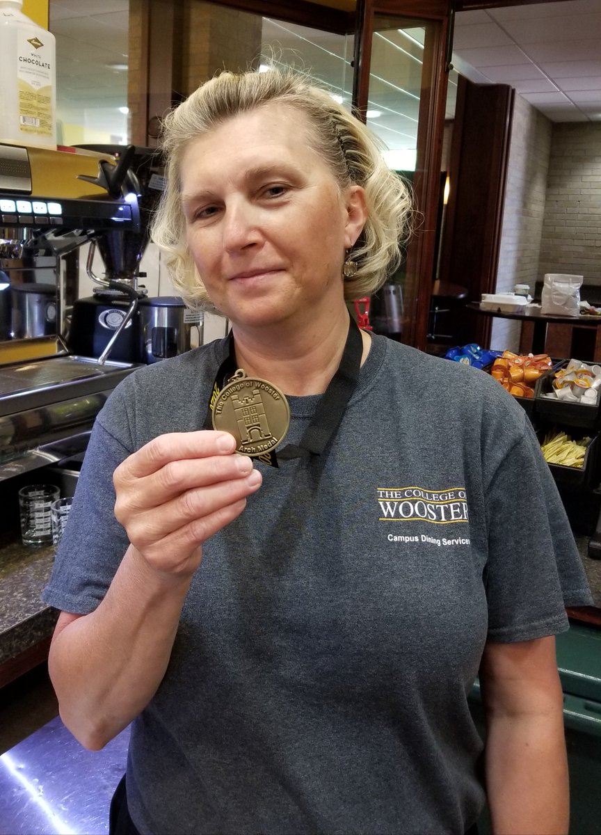 COWDining's tweet photo. Congratulations Becki Buckingham of MacLeod's convenience store at The College of Wooster for receiving an ARCH medal this year from senior Claire Montgomery '20.  Becki always has a smile waiting for our students!  #ArchMedal2020 https://t.co/KT8qe2uenM