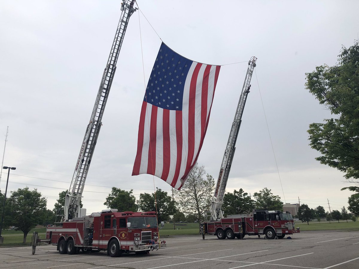 NoblesvilleFD's tweet photo. We are ready for the @NobSchools Senior Parade! Thank you @CarmelFireDept for lending us a ladder for this special event! 2 NHS Alums helped raise the flag, NFD Engineers Ryan Emmerson and Spencer Morris. CONGRATULATIONS SENIORS #Noblesville #WAT https://t.co/XzYRImfjGa