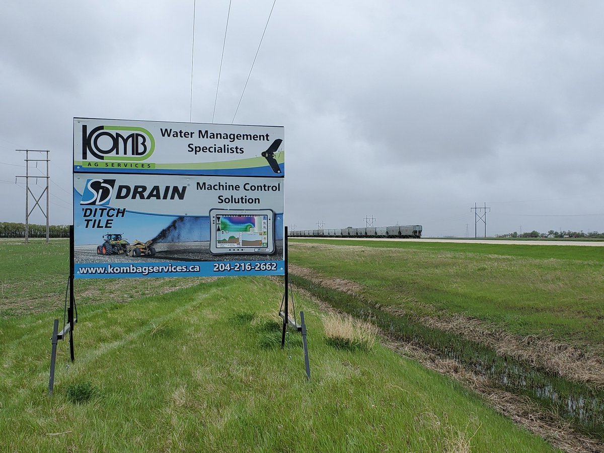 AltSigns's tweet photo. Installed this custom double-sided road sign with adjustable metal frame for KOMB Ag Services. If you see it while you are driving down Highway 3, be sure to give Marlen a call to discuss your flying and ditching options. #roadsign #kombagservices #ditching #sddrain #drone https://t.co/XsDUd2hKM5