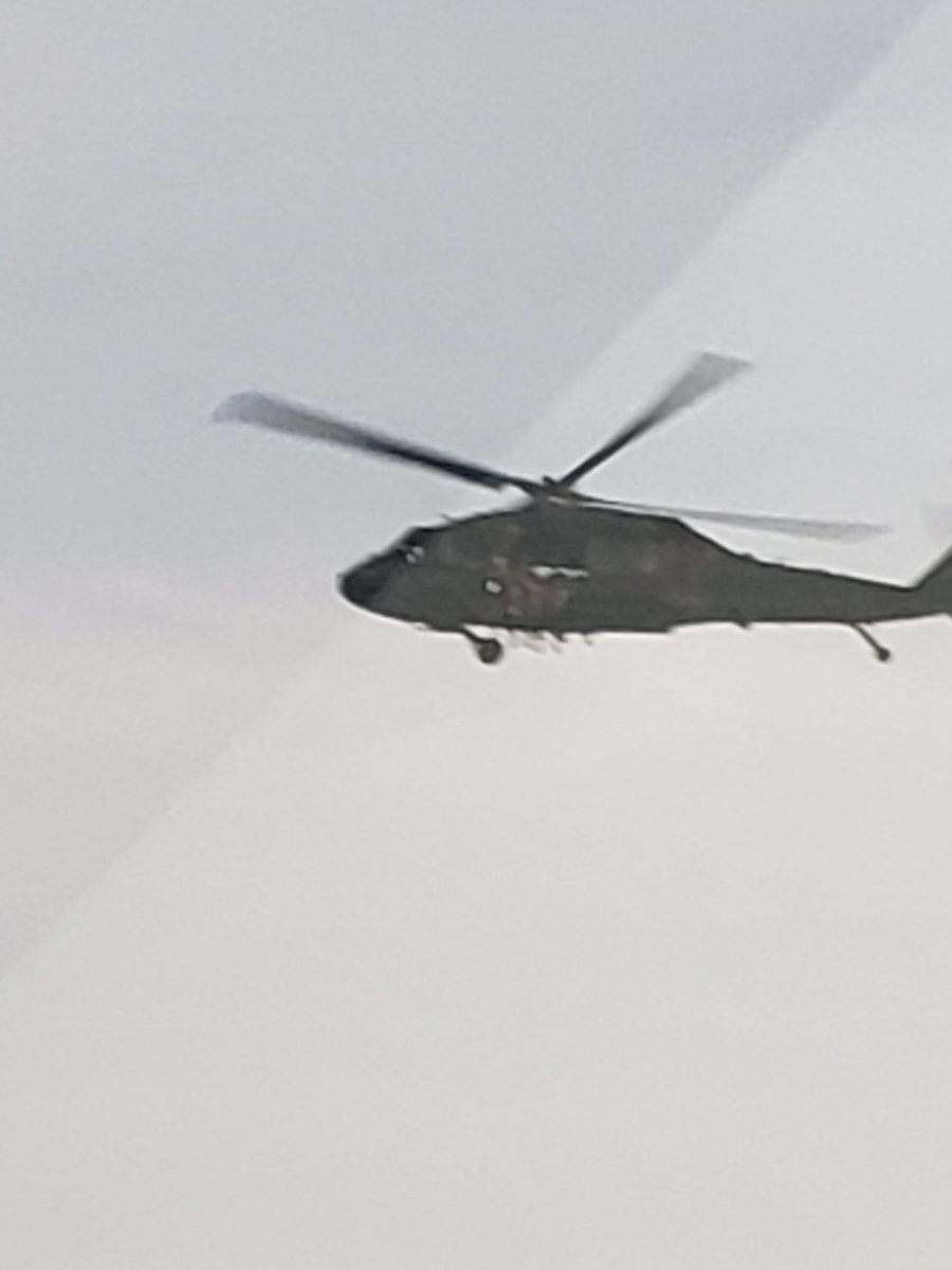 PaulShearon3's tweet photo. Blackhawk helicopters, troops hanging out the door flying over my condo in DC. Facsist Presidents gone completely crazy. https://t.co/PR8SKQOVFg