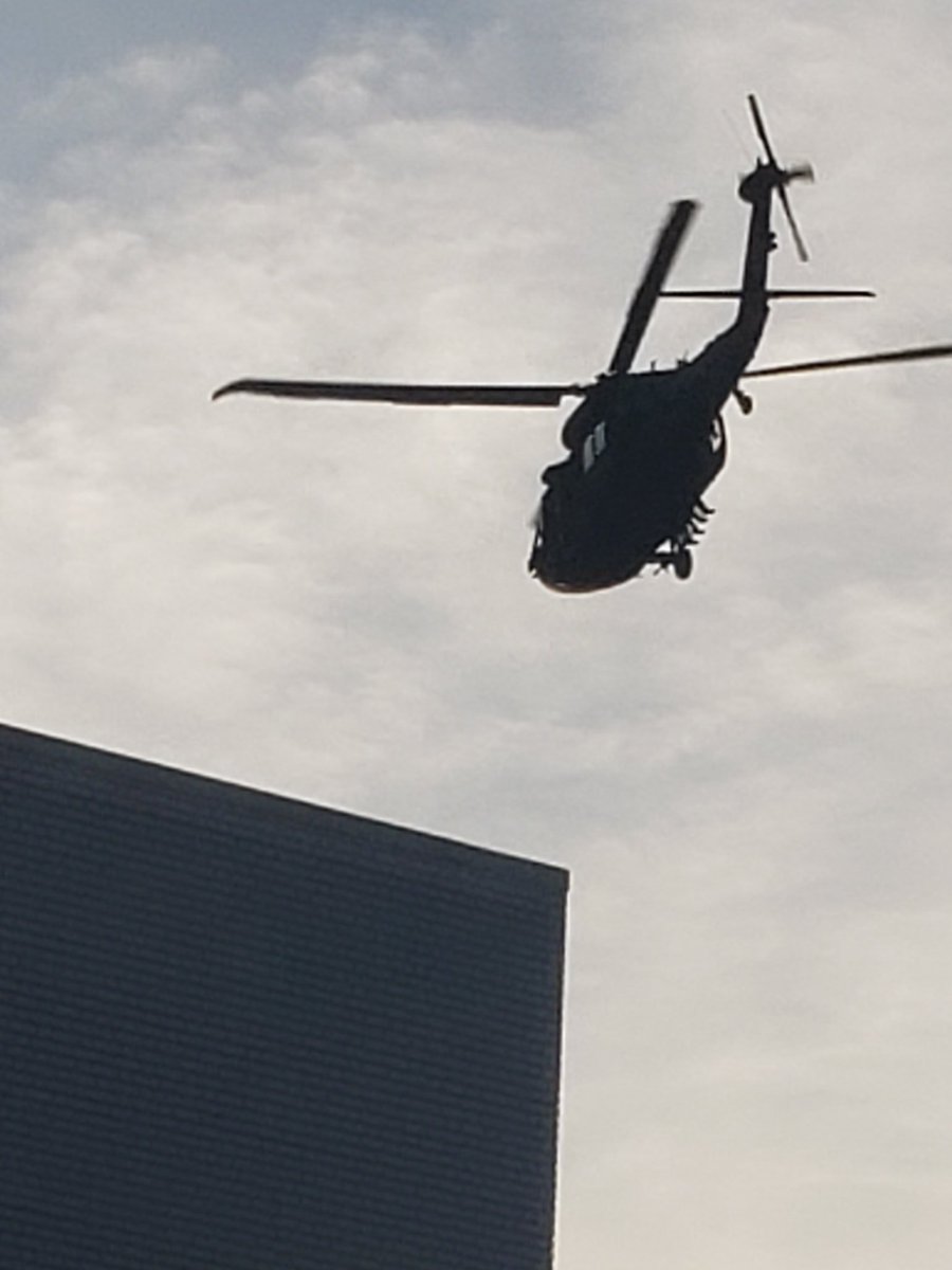 PaulShearon3's tweet photo. Blackhawk helicopters, troops hanging out the door flying over my condo in DC. Facsist Presidents gone completely crazy. https://t.co/PR8SKQOVFg