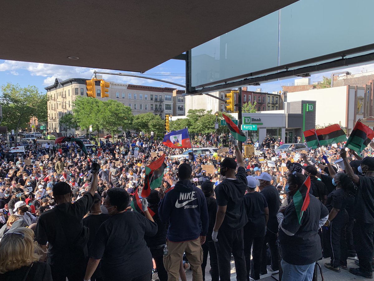 spiccoli's tweet photo. Fulton at Marcy a mass of people for a rally honoring #GeorgeFloyd earlier this evening on the steps of Restoration Plaza in BedStuy, with calls to work across racial and defund police. https://t.co/hrA5VQ4f2f