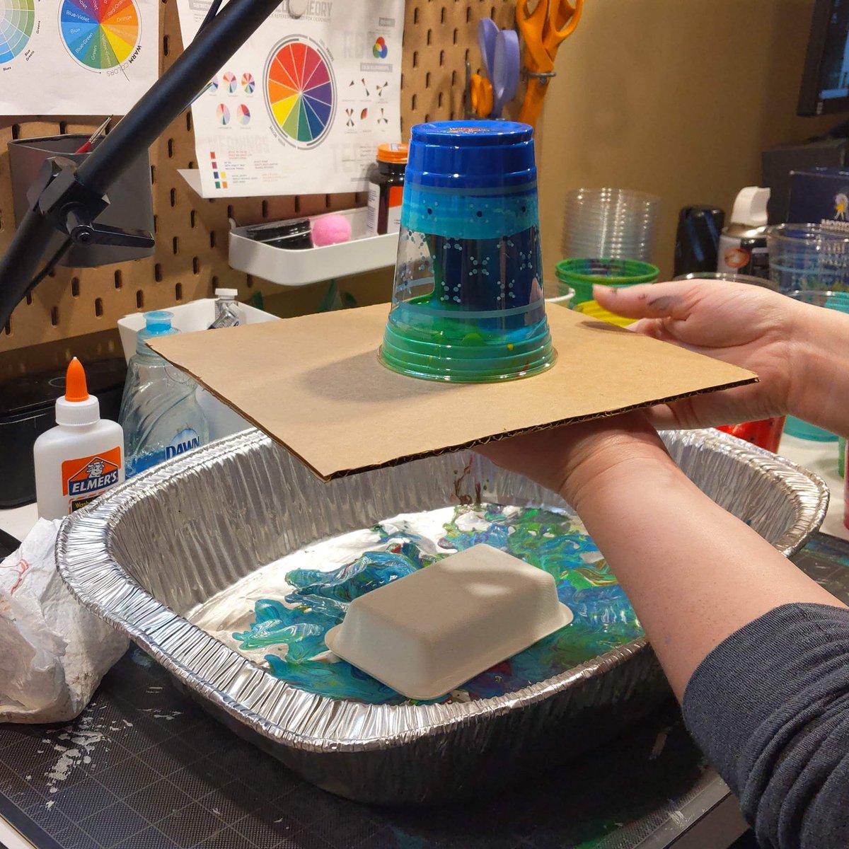 ArtwMrsK's tweet photo. Have acrylic paint at home? How about glue or dish soap? Check out the tutorial below on how to create an acrylic pour painting &amp; experiment with how those materials react together &amp; create art! No canvas? No problem! I used a cardboard box📦
https://t.co/QmfKWyjIQ5 https://t.co/pPAo7Ng1Nl