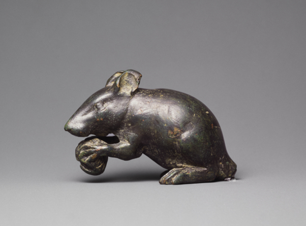 Ancient Artefact of the Day: A Bronze Mouse - with snack for nibbling; Roman, ca. 1st Century AD.Traditionally, such statuettes have been associated with the cult of the god Apollo Smintheus, but read on!  #AAOTD Image: Getty Museum (96. AC. 268)