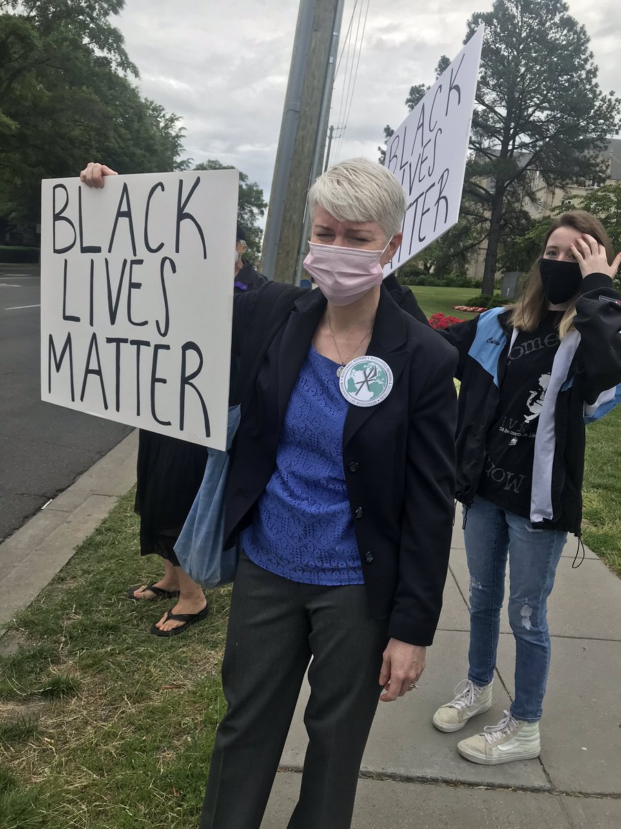 Demonstrating against Trump’s visit to JPII Center