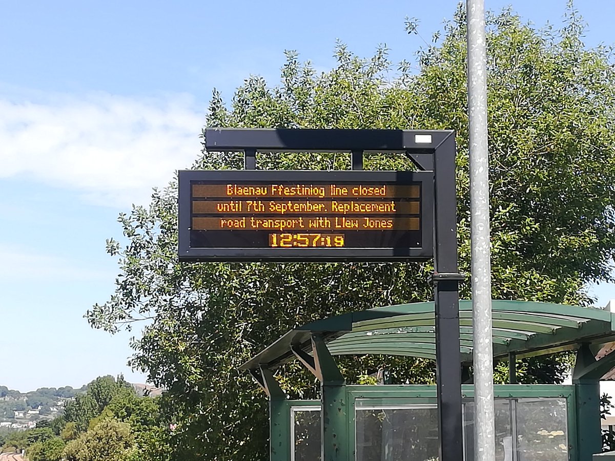 Robert16434394's tweet image. On national rail site, it states line to reopen 15/06/20, and the railreplacment bus service is completely different to the poster on the station at Glan Conwy.