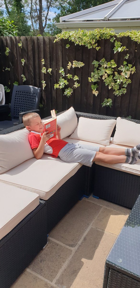 Pollthatch's tweet image. Dom really enjoyed the English lesson from Mr Mac about the Green Goblin. Here he is reading his favourite book outside as requested  #learnwithoak #ONAY3ENG
