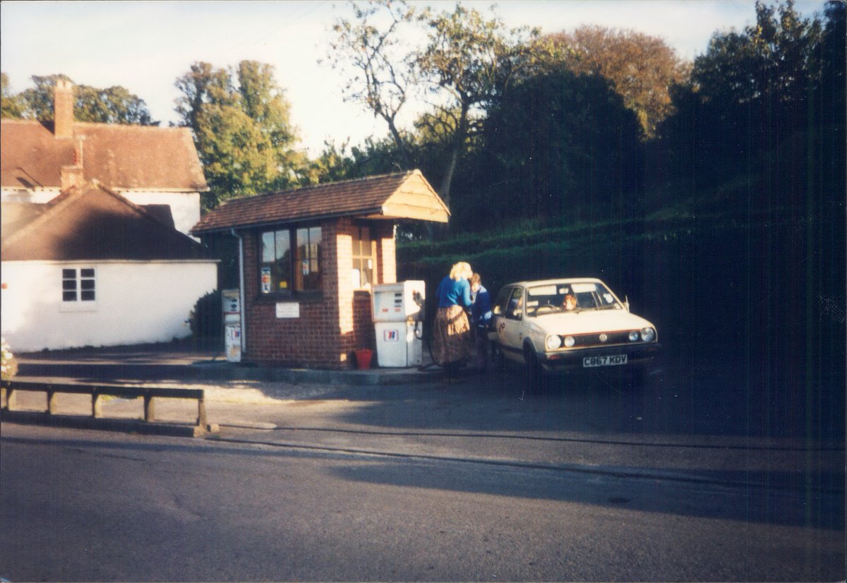 Day 163 of  #petrolstationsButler, Horningsham, Wiltshire 1996  https://www.flickr.com/photos/danlockton/16070782617/Just a little brick kiosk with two pumps—adjacent to the Longleat Estate—on a summer day in 1996. That's a VW Polo Plaza, a dealer special edition with sunroof & pinstripes, fondly remembered
