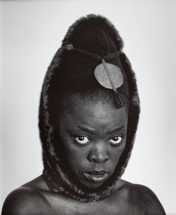 Boojebee's tweet photo. Zanele Muholi was born in Umlazi, a township southwest of Durban, South Africa, in 1972. From self-portraiture to photographs of Black lesbian, gay, bisexual, transgender, and intersex people living in South Africa... https://t.co/yfMBkR52Yz