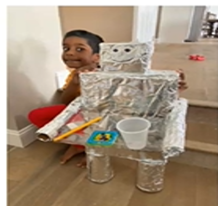 Ss are loving the "Not a Box" challenge. Today this student used his maker mind to create a robot! So proud!
@NHS_LES, #LittlestLions