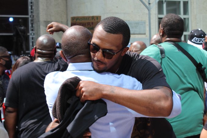 Mayor Turner hugs deshawn watson