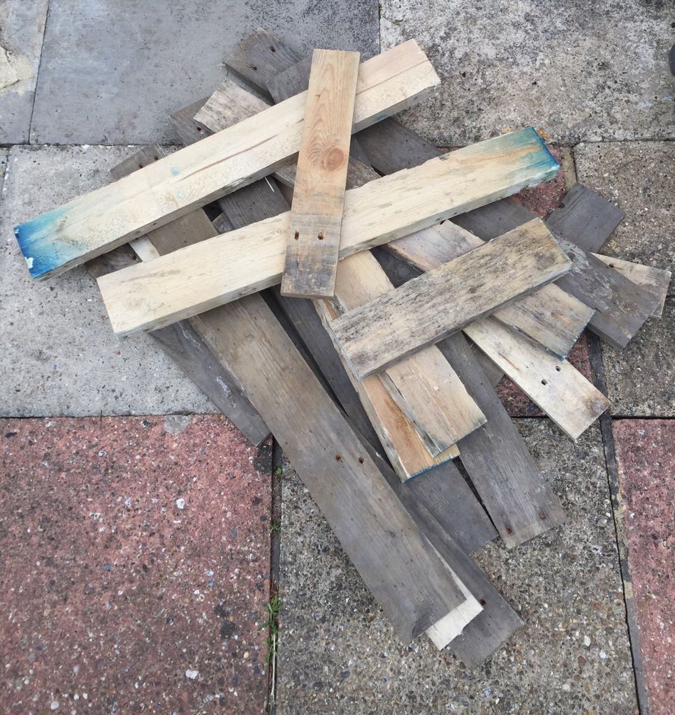 Adrian_Bourne's tweet photo. From one of these, to a pile of that, now just needs sanding, painting and assembling. All will be revealed soon ... #palletDIY https://t.co/uZlNSWIyhq