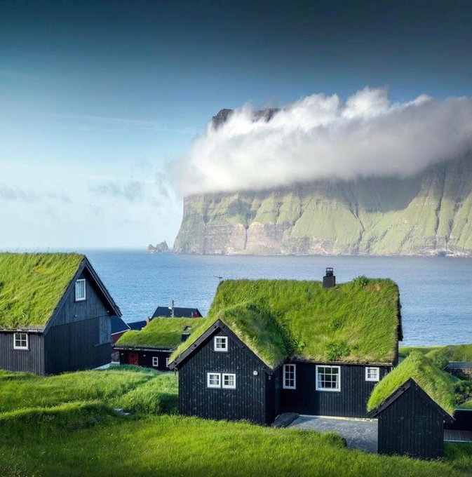 A sod roof, or turf roof, is a traditional Scandinavian type of green roof covered with sod on top of several layers of birch bark on gently sloping wooden roof boards buff.ly/2ULfwll [photo: Faroe Islands by İlhan Eroğlu, IG:  buff.ly/2NeE0Dk]