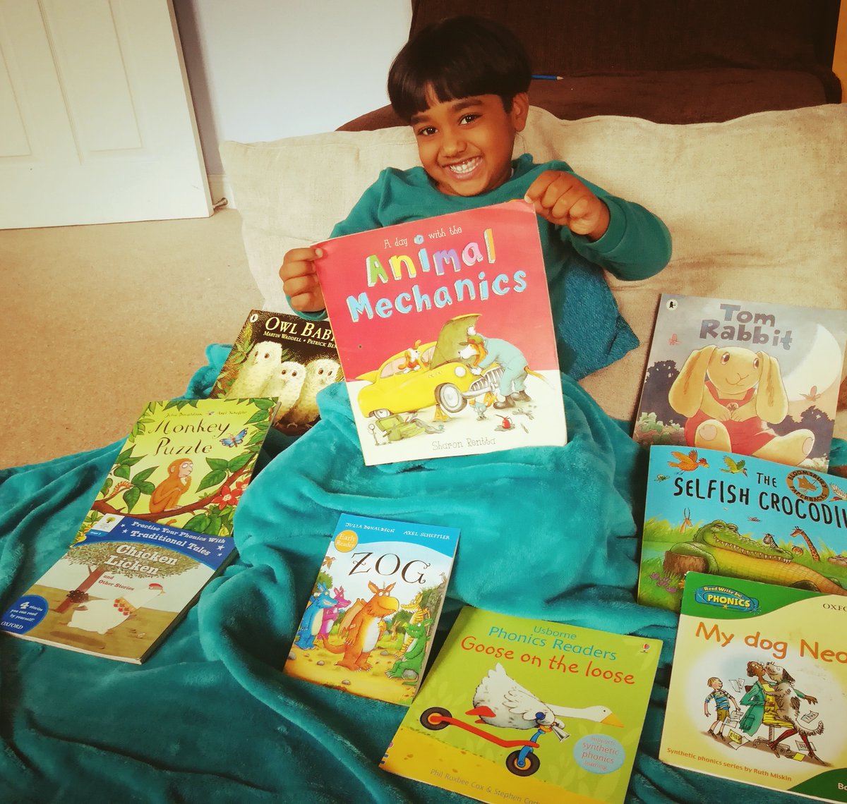 DsilvaFay's tweet photo. Bryce @GrangeEYFS making the most of the rainy day getting cosy in a reading corner....  He's all set with  his animal story books!!! https://t.co/NXvMCPcMVy