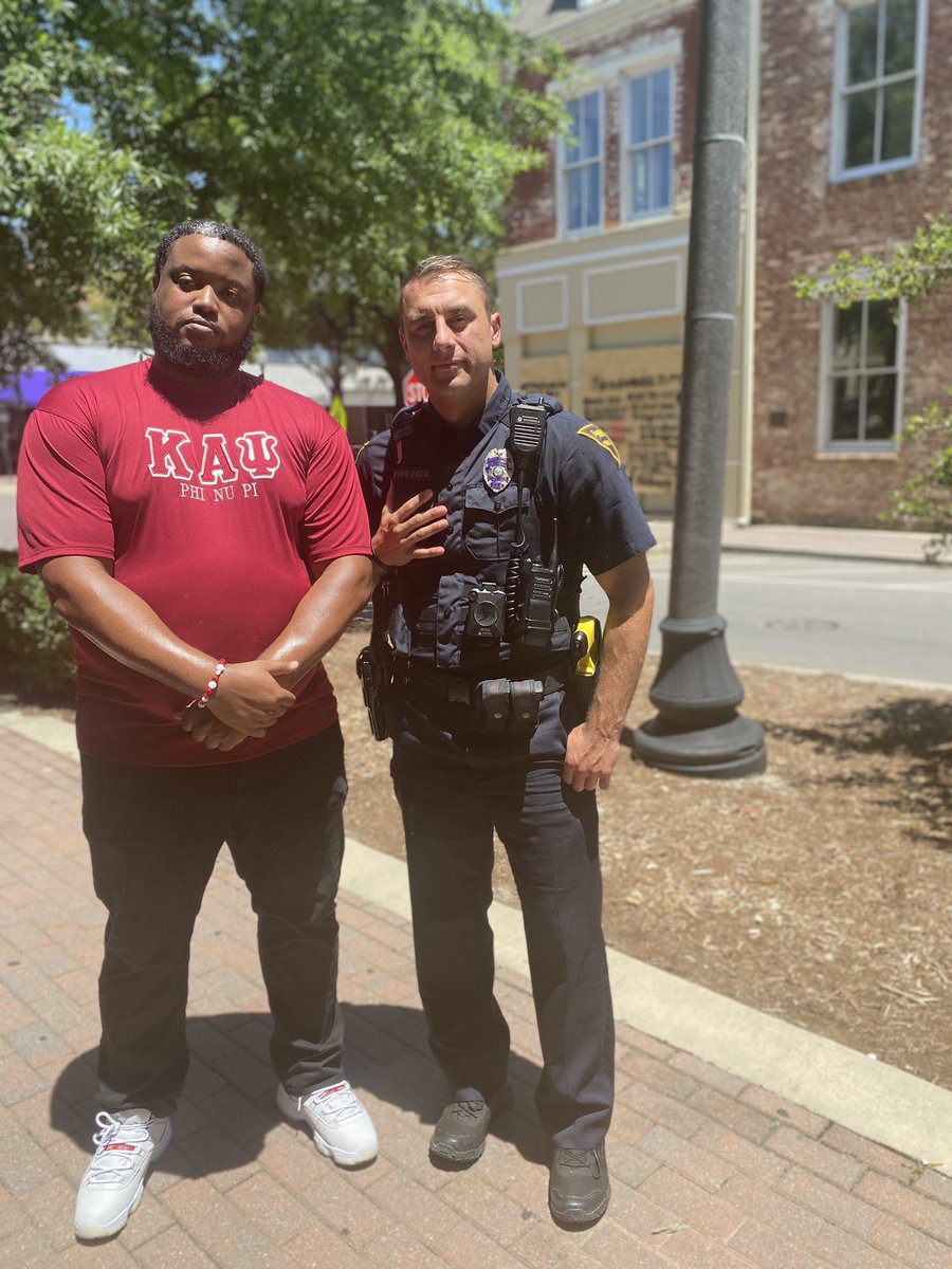 Remember seeing that powerful image of <a href="/FayettevillePD/">Fayetteville Police</a> kneeling in solidarity with protestors Monday night?   These are the men behind that symbol of unity. Meet Joshua Wiley and Officer Benjamin Zacharias. I’ll have the full story at 5. #abc11