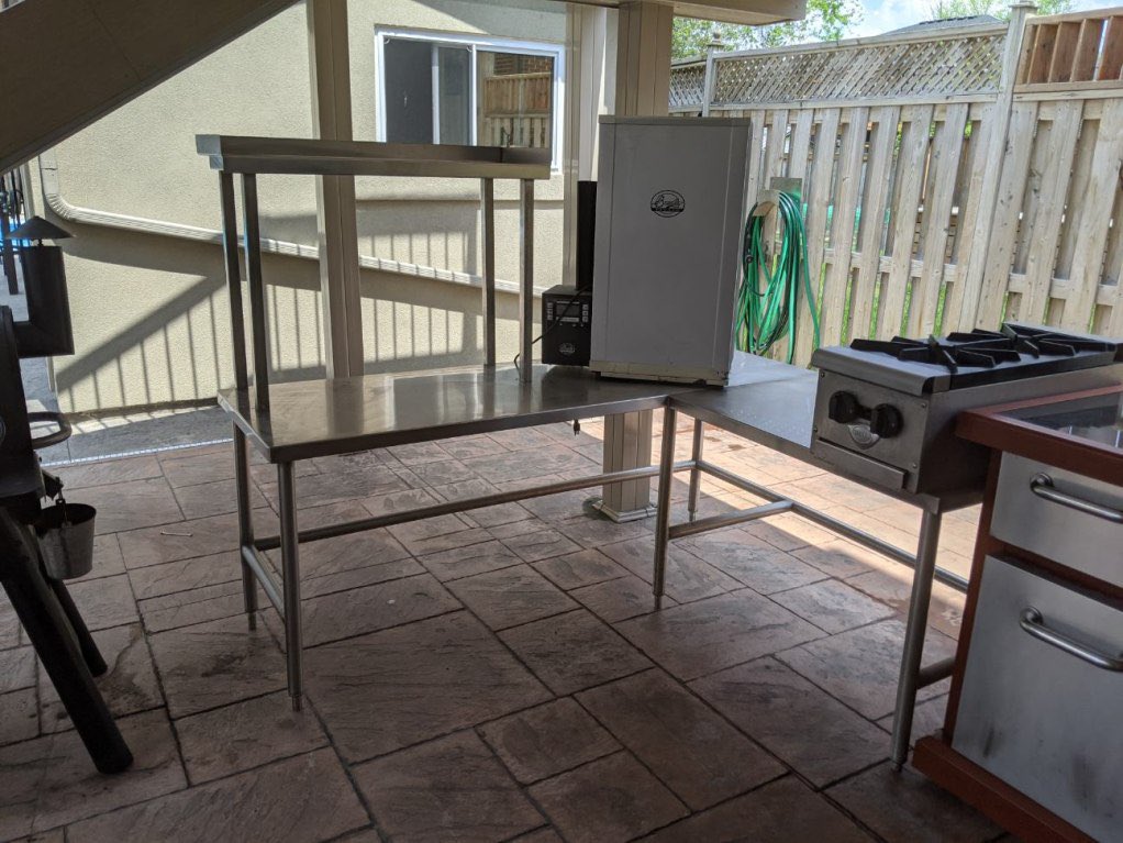 PMFKyle's tweet image. Everyone staying at home and grilling season well under way we’re doing more residential custom work. Check out these stainless steel tables and upper shelf which add prep area and a more defined cooking space!! #kwawesome #outdoorliving #BBQLife #cookathome