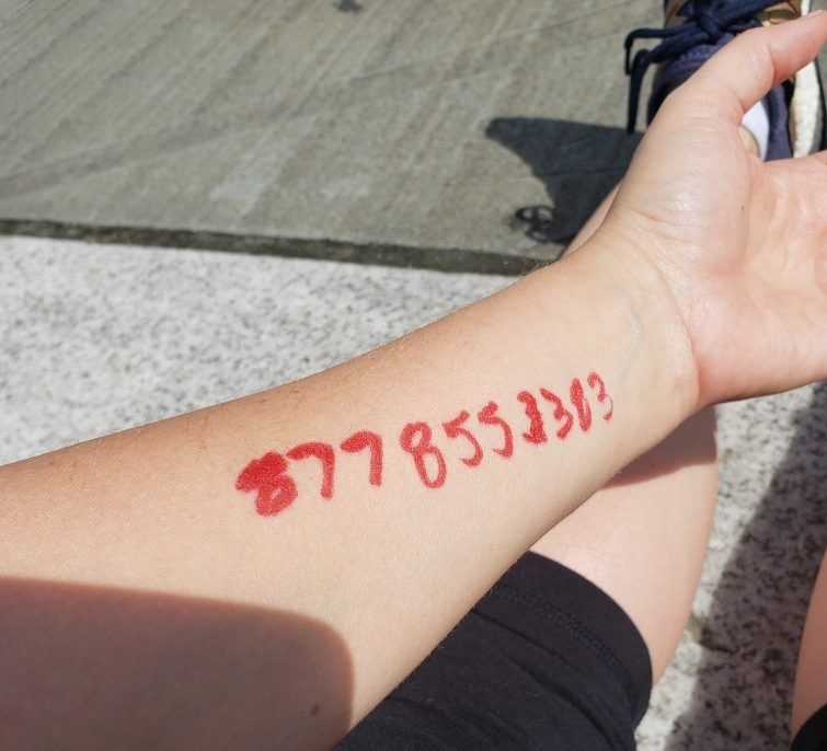 Write an emergency number on your arm beforehand. As well as any of the hundreds, if not thousands, of lawyers phone numbers who have agreed to represent protesters pro bono. VERY VERY IMPORTANT unless you wanna sit in jail.