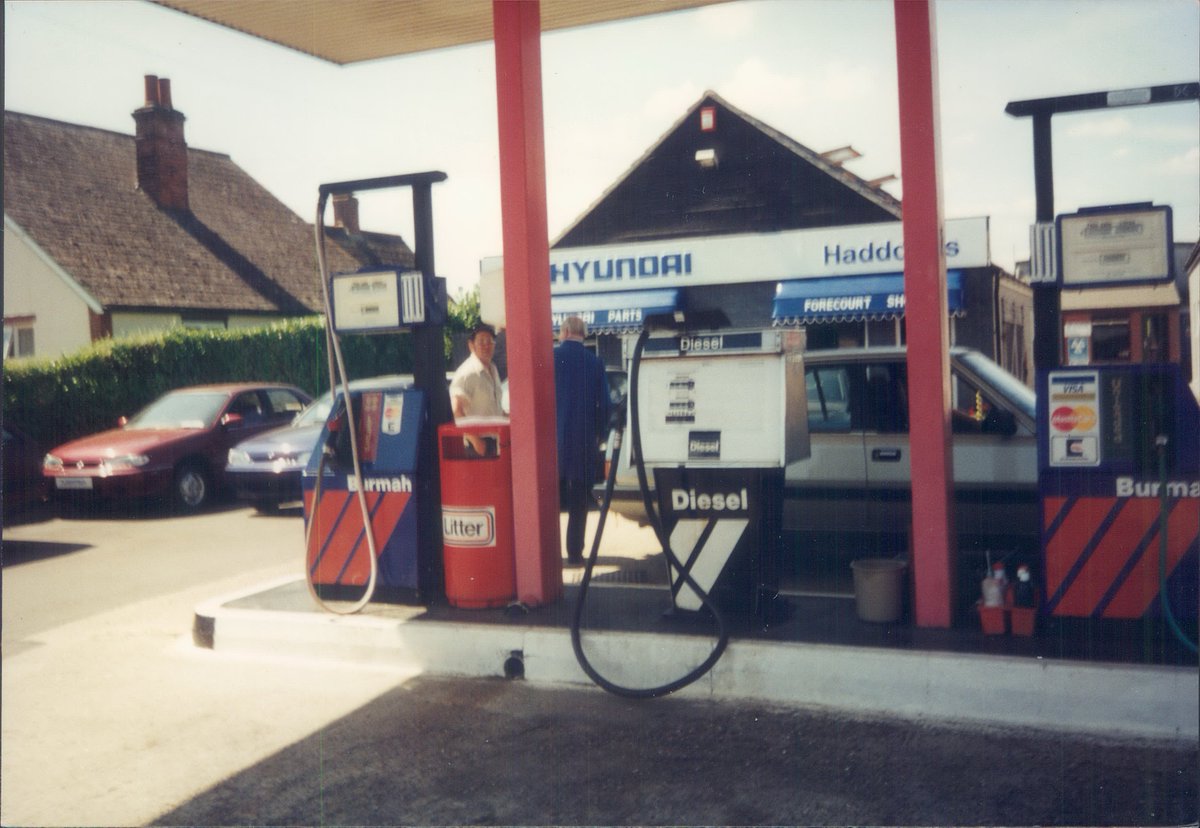 Day 164 of  #petrolstationsBurmah, Haddocks Hyundai, Fox Street, Essex, 1995  https://www.flickr.com/photos/danlockton/16230731926/  https://www.flickr.com/photos/danlockton/16070500909/  https://www.flickr.com/photos/danlockton/16070787377/Last days of the Burmah 'barrel' logo; the fuel business was bought by Save Service Stations in 1995. Note the Hyundai Scoupé.