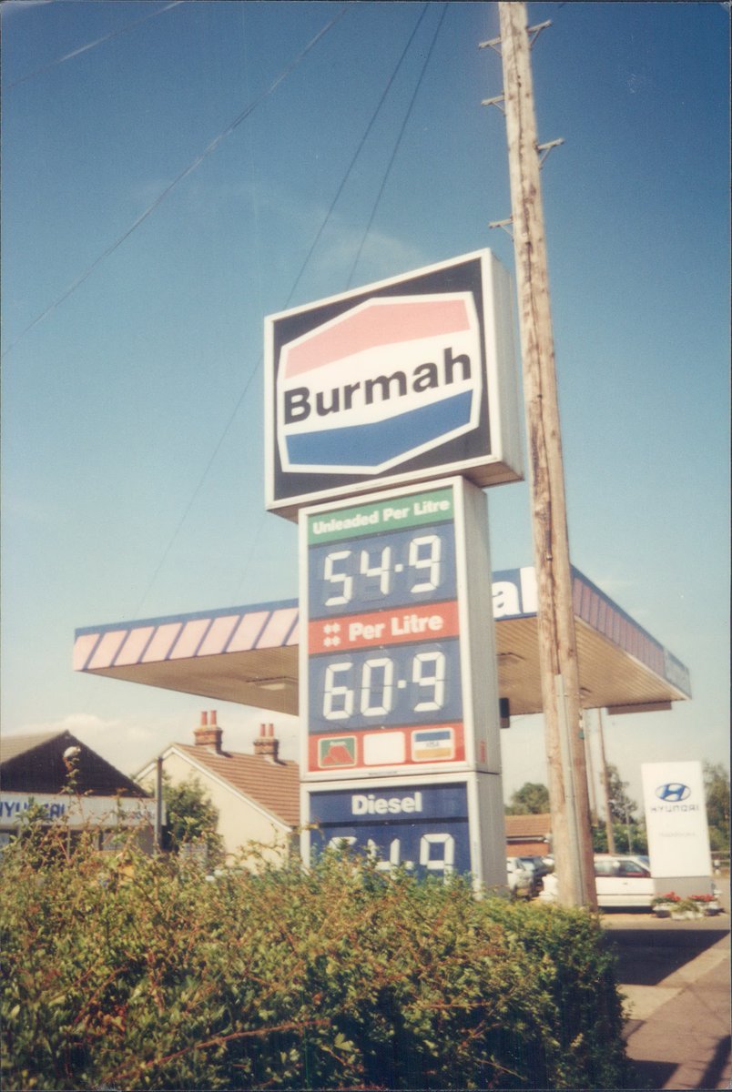 Day 164 of  #petrolstationsBurmah, Haddocks Hyundai, Fox Street, Essex, 1995  https://www.flickr.com/photos/danlockton/16230731926/  https://www.flickr.com/photos/danlockton/16070500909/  https://www.flickr.com/photos/danlockton/16070787377/Last days of the Burmah 'barrel' logo; the fuel business was bought by Save Service Stations in 1995. Note the Hyundai Scoupé.