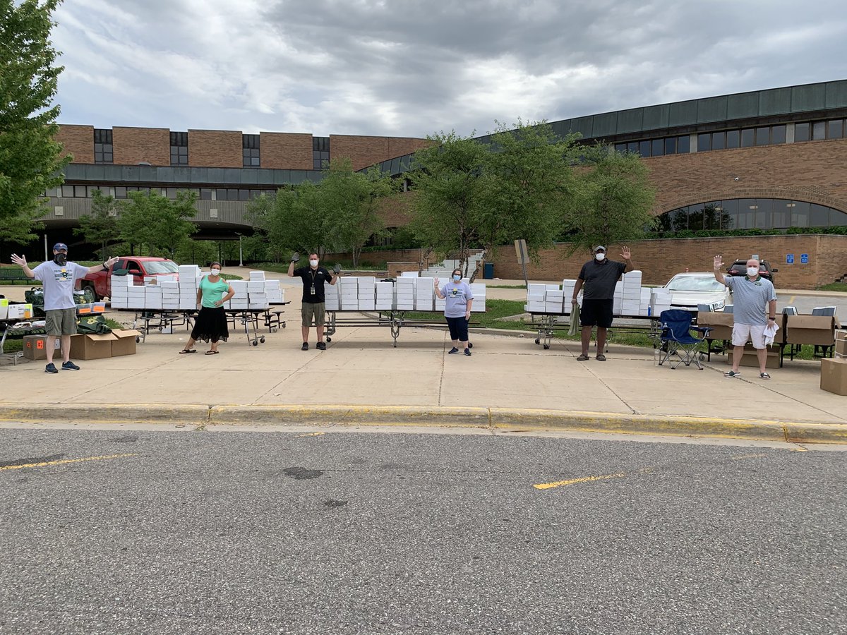 Huron’s Admin Team members, wearing PPE, are ready to distribute senior items to families  today using social distancing guidelines. We are looking forward to seeing our seniors even if it is through car windows!