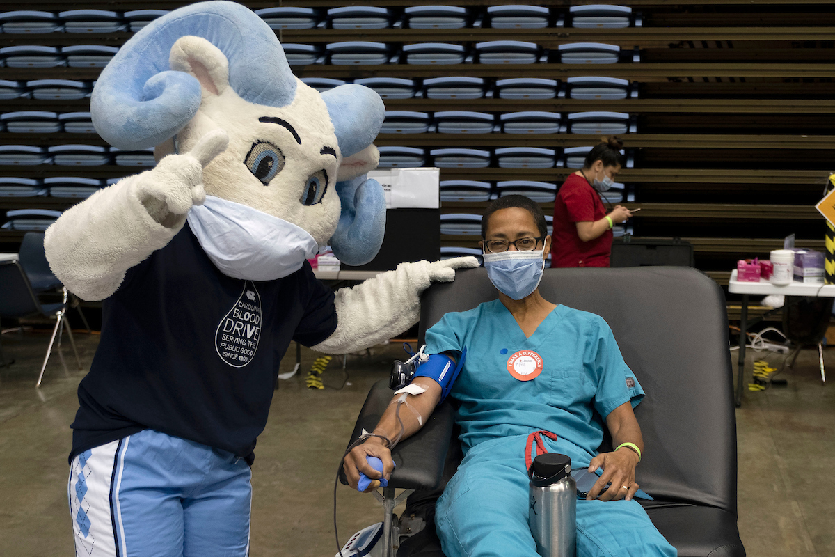 Woman and RJ pose for a picture 