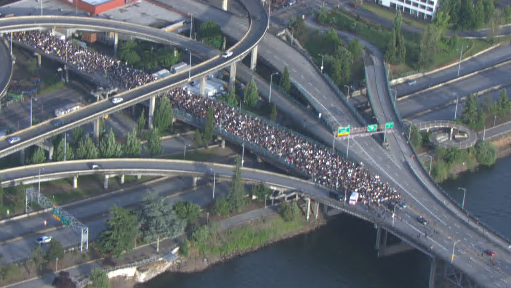 KGWNews's tweet photo. Thousands are peacefully marching across the Morrison Bridge in Portland in solidarity with George Floyd, and to protest police brutality and racism https://t.co/pkYD1i9wLJ