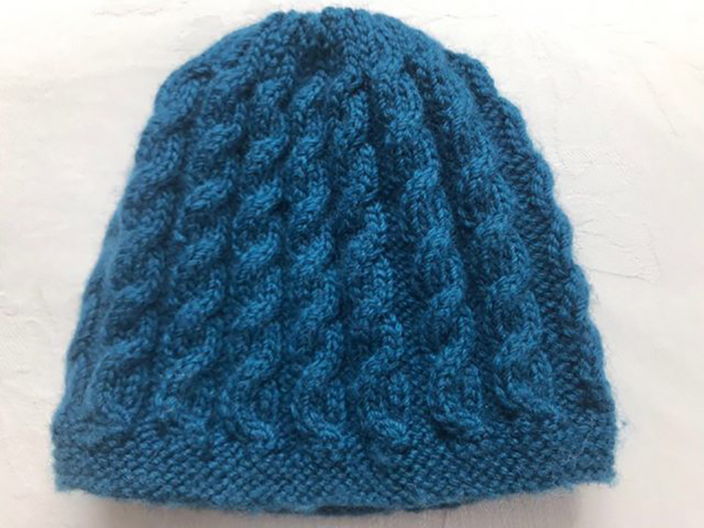 “The rhythmic working of pure merino wool on bamboo needles is calming and mindful. A gift for a friend’s baby.”

– Angela Woodward