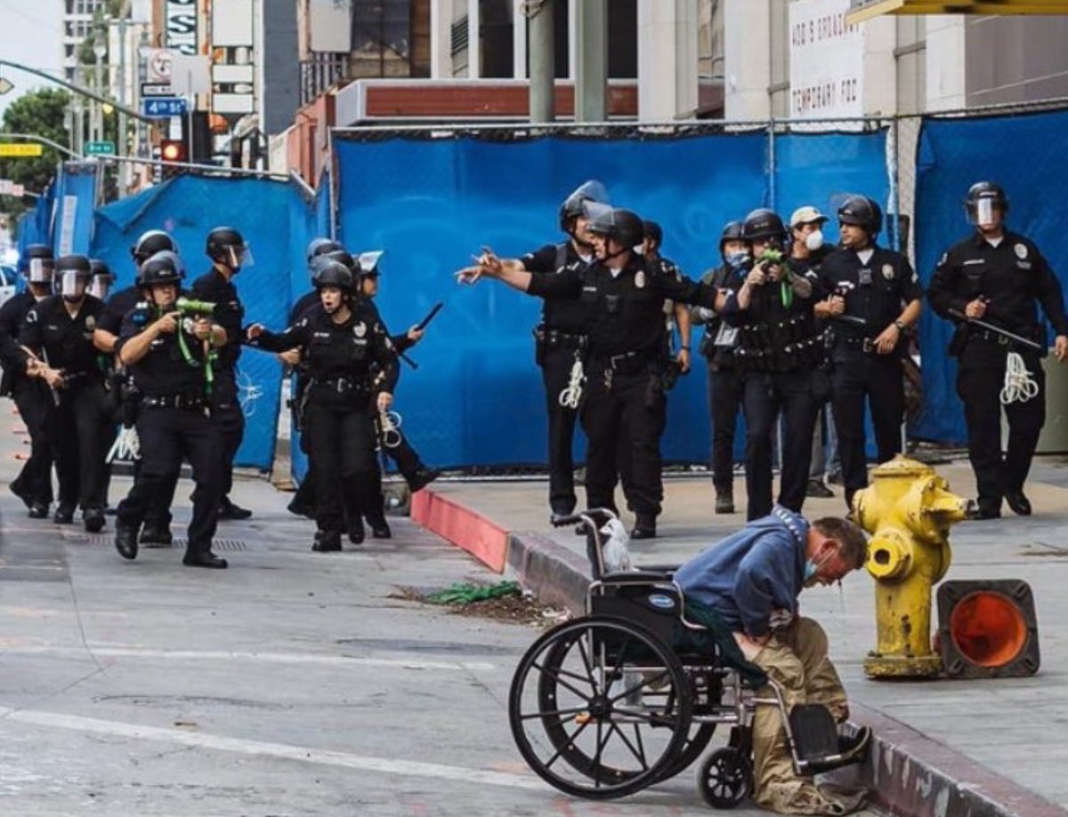 Disgusting: IN A WHEELCHAIR, HOMELESS, NOT PROTESTING...