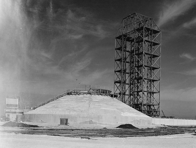 Saturn 1 Launch Pad, Launch Complex 34 in black and white. Support gantry in the background and conical blockhouse in the foreground.