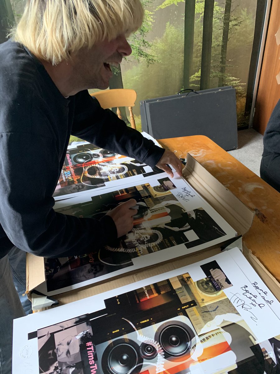 Tim_Burgess's tweet photo. Headed to the studio to work. 
Signed some of the ace @MicrodotCreativ #TimsTwitterListeningParty prints - they’ll be on sale next week, raising funds for the people in the music world who are most in need. Listening party superhero @BoneheadsPage has signed them too ; ) https://t.co/iujb76N9sH