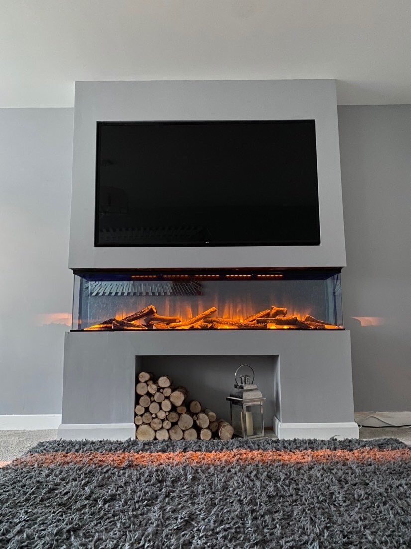 Fantastic recently completed installation of our e1800 with feature log box, shared by <a href="/project/">Microsoft Project</a>.no9 🙌🙌🙌 Amazing job! Happy Friday @evonicfires #happycustomer #modernlivingroom #style #logstore #flameeffects #fireplace #fire