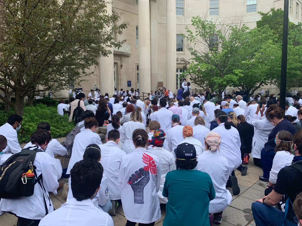 Hundreds of white coats and health care workers building community, demanding justice, and kneeling outside the Yale School of Medicine. #BlackLivesMatter #GeorgeFloyd