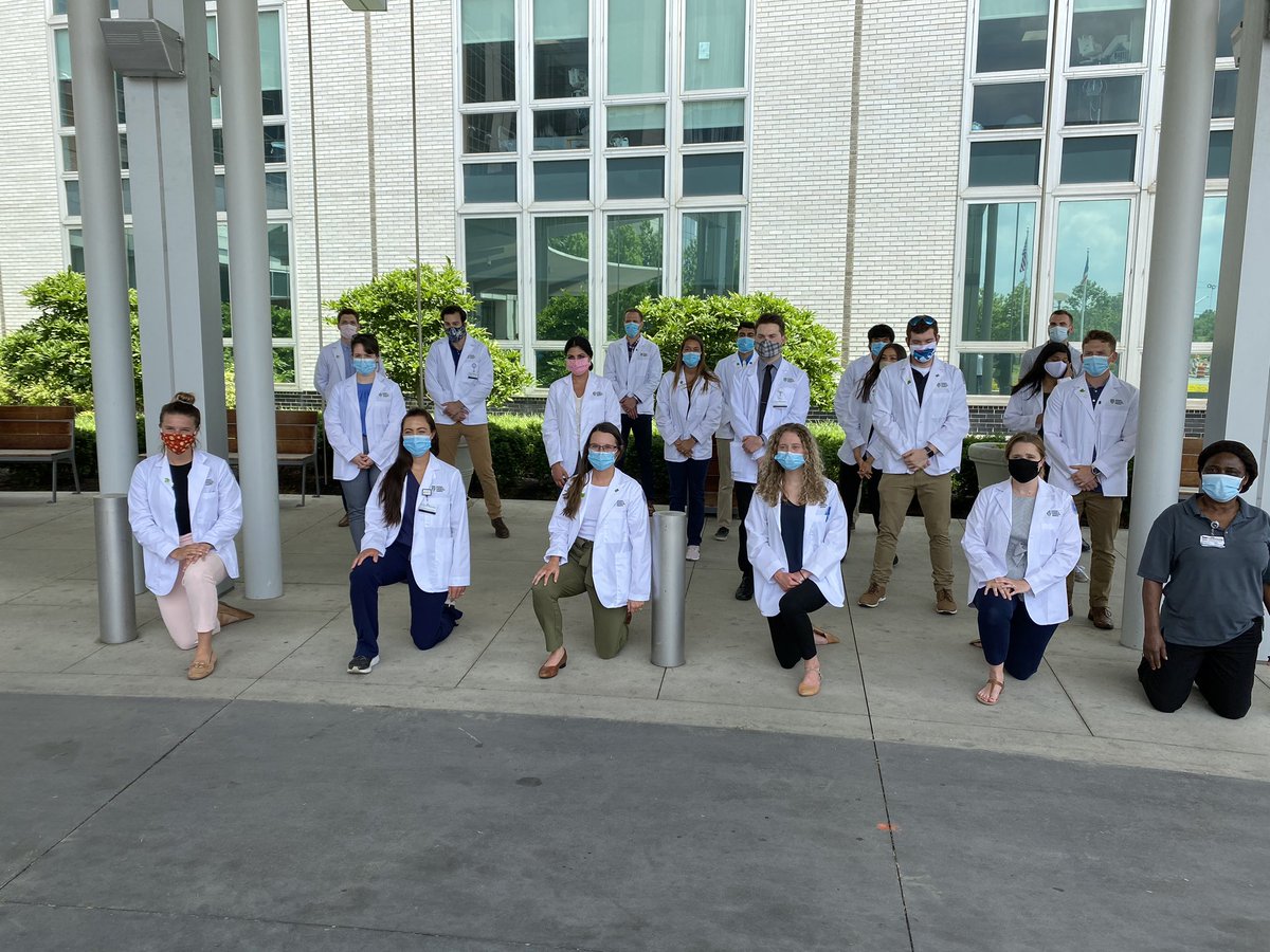 OHSimDoc's tweet image. The @OUHCOM students at the #whitecoatsforblacklives moment of silence across @ohiohealth and #centralohio. #ohpds #ohiohealthpds #WhiteCoatsforBlackLivesCBUS #blackmeninmedicine