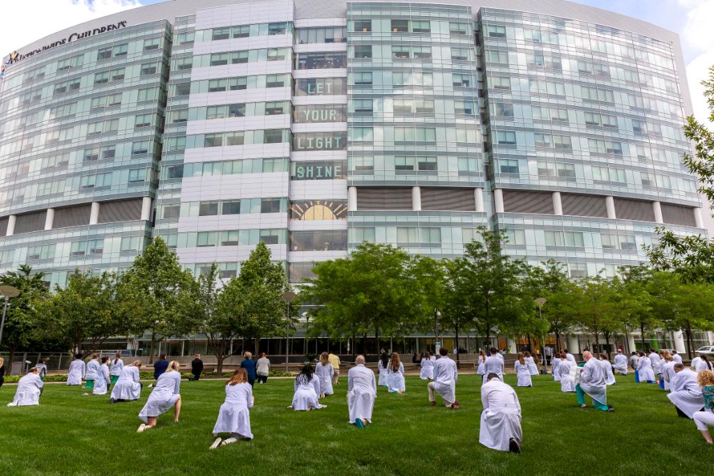 Nationwide Children's Hospital (@nationwidekids) on Twitter photo Today, to acknowledge racism and racial disparities as a public health crisis, @NCHMedEd, <a href="/NCHforDocs/">Nationwide Children's Clinical & Research Updates</a> and @Nationwidekids teams joined with @ohiostatemed and medical schools across the country to kneel in solidarity and support for #WhiteCoatsforBlackLives. Today, to acknowledge racism and racial disparities as a public health crisis, @NCHMedEd, <a href="/NCHforDocs/">Nationwide Children's Clinical & Research Updates</a> and @Nationwidekids teams joined with @ohiostatemed and medical schools across the country to kneel in solidarity and support for #WhiteCoatsforBlackLives.