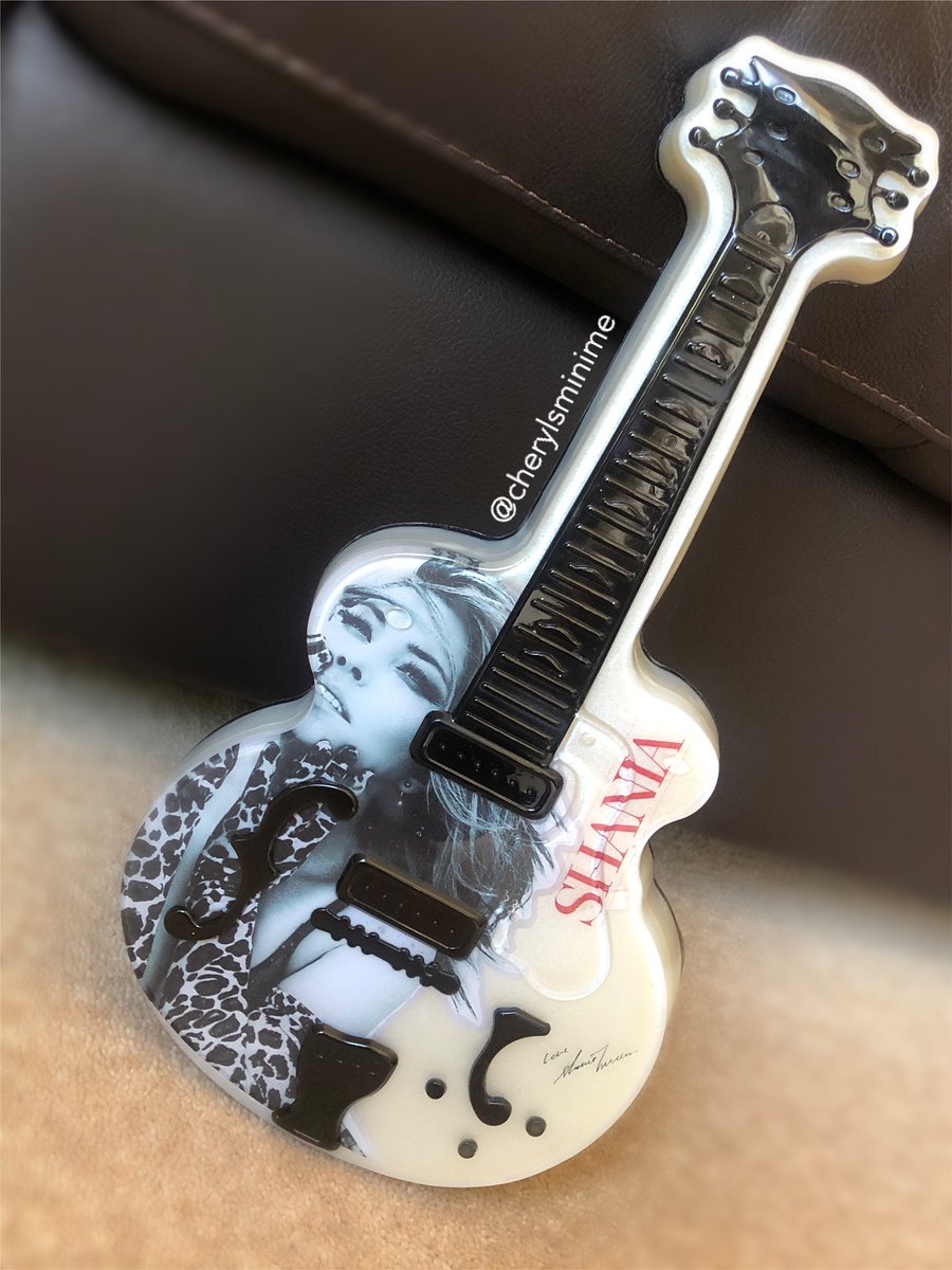 Sophxsp's tweet photo. I didn’t know whether to post this or not but, I got into doing resin art at the start of lockdown, &amp; I remember last year I wanted this Shania guitar that was going for around $200 I think(🤣).. so I had the idea to make myself an ornamental one &amp; idk I just really love it☺️ https://t.co/1HrvfV7gXD