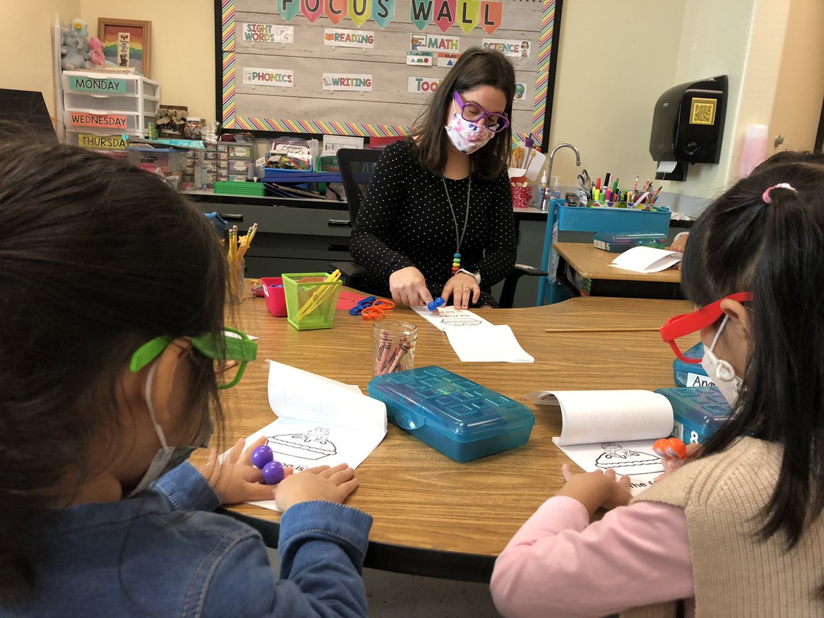 Fun, engaging and interactive reading group happening for these eager #kindergarteners - including glasses &amp; extra eyes!