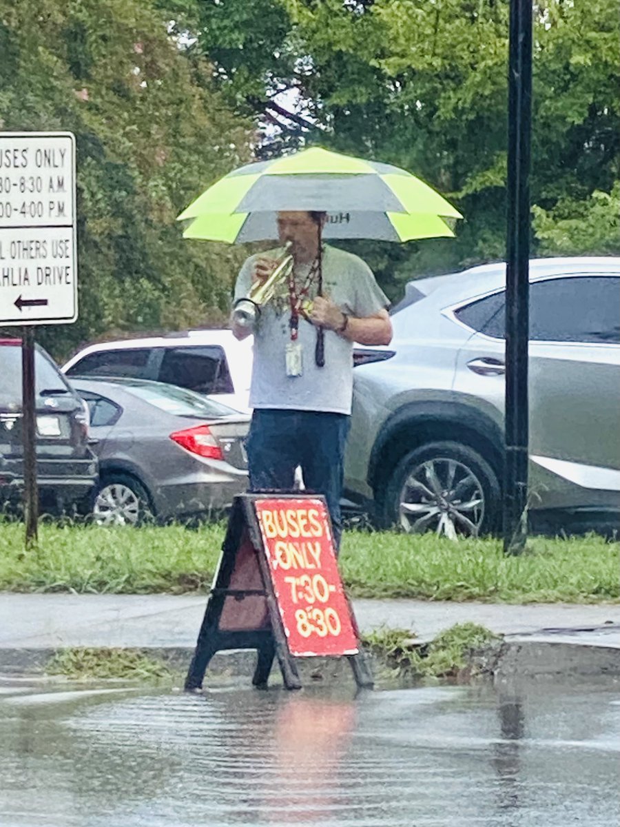 Each morning Dr. Greene, Gresham Band Director plays instruments to greet kids. Today he was playing the trumpet in the RAIN, people. Things aren’t ideal these days and it’s tough. But there’s a teacher playing a trumpet in the rain. Look for the good! It’s there! @gmprincipal