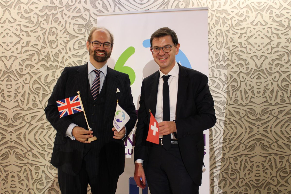 swiss_un's tweet image. After 2⃣ very special years, the 🇨🇭#CCMSwissPresidency now passes the baton to 🇬🇧 Amb. Aidan Liddle &amp;amp; wishes him all the best for the #10MSP of the Convention on Cluster Munitions! #CCM2RevCon