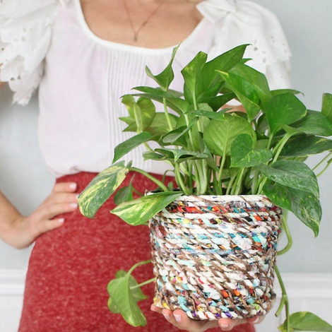 Is this DIY planter too colorful or just right? It's made of nothing more than scrap twine! goo.gl/Ii9ZIx